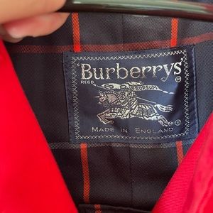 Vintage red Burberry trench coat with detachable liner in excellent condition.